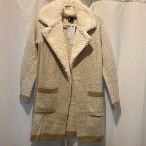 Beige coat with faux fur trim